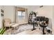 Bright home office with a large window, neutral colors and room for two workstations at 2116 W 101St Cir, Thornton, CO 80260