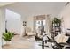 Inviting home office with cozy seating, lots of light and space for remote working at 2116 W 101St Cir, Thornton, CO 80260