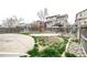 Backyard featuring a partially grassy yard, wood fencing, and a concrete patio at 6358 E 121St Pl, Brighton, CO 80602