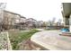 Wide backyard view featuring rock border and concrete patio at 6358 E 121St Pl, Brighton, CO 80602