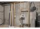 Unfinished basement with exposed ductwork, water heater, and laundry hookups at 6358 E 121St Pl, Brighton, CO 80602