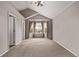 A carpeted bedroom is brightly lit by a bay window and has neutral paint at 6358 E 121St Pl, Brighton, CO 80602