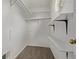 A small closet with built in shelves and a clothes rod for extra storage at 6358 E 121St Pl, Brighton, CO 80602