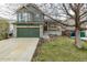 Charming two-story home with an attached garage and a quaint, covered front porch at 6358 E 121St Pl, Brighton, CO 80602