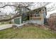 Inviting two-story home with a covered front porch and attached garage, great curb appeal at 6358 E 121St Pl, Brighton, CO 80602