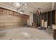Spacious two-car garage with ample storage space and concrete flooring at 6358 E 121St Pl, Brighton, CO 80602