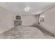 Spacious living room with stylish vinyl flooring, a cozy fireplace, and great natural light at 6358 E 121St Pl, Brighton, CO 80602