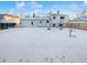 Large backyard with snow covering the ground at 481 S Lima Cir, Aurora, CO 80012