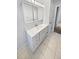 Bathroom with vanity, tile flooring, and mirrored medicine cabinet at 481 S Lima Cir, Aurora, CO 80012