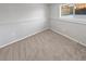 Bright bedroom with new carpet and neutral walls at 481 S Lima Cir, Aurora, CO 80012