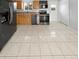 Kitchen with stainless steel appliances and light wood cabinets at 481 S Lima Cir, Aurora, CO 80012