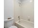 The bathroom features a shower and tub with tile surround at 2974 E Otero Cir, Centennial, CO 80122