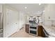 Bright, modern kitchen with stainless steel appliances and granite countertops at 2974 E Otero Cir, Centennial, CO 80122