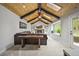 Bright living room offers vaulted ceilings, a stone fireplace, and a comfortable sitting area at 2974 E Otero Cir, Centennial, CO 80122