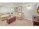 The living room features a sectional sofa and movie posters on the wall at 2974 E Otero Cir, Centennial, CO 80122