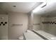 Clean bathroom with a shower-tub combination, a spacious vanity, and essential amenities at 1652 Egret Way, Superior, CO 80027