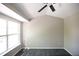 A bright bedroom with large window and ceiling fan, provides a relaxing retreat at 1652 Egret Way, Superior, CO 80027