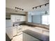 Open concept kitchen overlooking the living area and balcony at 1652 Egret Way, Superior, CO 80027