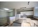 Bright open kitchen next to living space and stairs at 1652 Egret Way, Superior, CO 80027