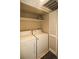 Functional laundry room with washer, dryer, shelving and closet space at 1652 Egret Way, Superior, CO 80027