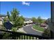 Balcony view of well maintained landscape and neighborhood street at 1652 Egret Way, Superior, CO 80027