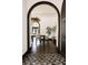Formal dining area with dark wood floors, statement chandelier, and view of the exterior at 3 Carriage Brook Rd, Cherry Hills Village, CO 80121