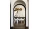 Elegant dining room with decorative chandelier and ample seating for Gathering and guests at 3 Carriage Brook Rd, Cherry Hills Village, CO 80121