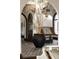 Foyer featuring tiled floors, potted plant and archways leading to other rooms at 3 Carriage Brook Rd, Cherry Hills Village, CO 80121