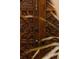 Close-up of the intricate details on the carved wood of the home's double front doors at 3 Carriage Brook Rd, Cherry Hills Village, CO 80121