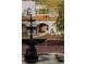A beautiful fountain welcomes you to this home's elegant front entrance with decorative double doors at 3 Carriage Brook Rd, Cherry Hills Village, CO 80121