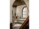 Stylish living room with a window seat, decorative beams, and a grand piano at 3 Carriage Brook Rd, Cherry Hills Village, CO 80121