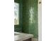 Shower features green tile walls, glass enclosure, and natural light at 3 Carriage Brook Rd, Cherry Hills Village, CO 80121