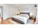 Bedroom boasts hardwood floors, a large window with natural light and a double closet at 3049 S Williams St, Denver, CO 80210