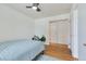 Bright bedroom features hardwood floors, a ceiling fan, and a cozy atmosphere at 3049 S Williams St, Denver, CO 80210