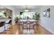 Inviting dining room with ample natural light and a view of the kitchen at 3049 S Williams St, Denver, CO 80210
