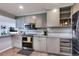 Spacious kitchen with stainless oven and microwave and plenty of cabinet storage at 3049 S Williams St, Denver, CO 80210