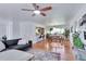 Spacious living area showcases an open concept with dining and kitchen at 3049 S Williams St, Denver, CO 80210