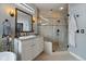 Bathroom featuring vanity with stone countertop and glass-enclosed shower at 1159 Buffalo Ridge Rd, Castle Pines, CO 80108