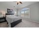 Bedroom with vaulted ceiling, large windows and neutral colors at 1159 Buffalo Ridge Rd, Castle Pines, CO 80108