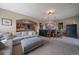 Large open living space with bar, pool table and comfortable seating at 1159 Buffalo Ridge Rd, Castle Pines, CO 80108