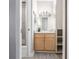Clean bathroom with light wood vanity and shower/tub combo at 1196 N Grant St # 204, Denver, CO 80203