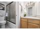 Bathroom features a shower/tub, toilet, and vanity at 1196 N Grant St # 204, Denver, CO 80203