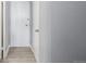 Simple entryway with light gray walls and wood-look flooring at 1196 N Grant St # 204, Denver, CO 80203