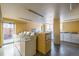 Clean laundry room with multiple washing and drying machines at 1196 N Grant St # 204, Denver, CO 80203
