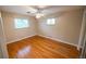 Cozy bedroom with hardwood floors and natural lighting at 2592 S Winona Ct, Denver, CO 80219