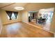 Large living and dining areas featuring hardwood floors and plenty of space at 2592 S Winona Ct, Denver, CO 80219