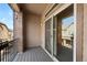 Cozy balcony with sliding door access, perfect for relaxation and enjoying the outdoors at 558 E Dry Creek Pl, Littleton, CO 80122