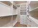 Organized walk-in closet with custom shelving and ample storage space at 558 E Dry Creek Pl, Littleton, CO 80122