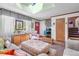 Inviting living room with a skylight, a red door, and cozy furniture at 11279 E Alaska Pl, Aurora, CO 80012