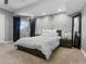 Cozy bedroom with carpet, natural light from the window and decor at 425 Steele St, Denver, CO 80206